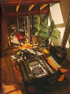 a living room filled with furniture and a fire place