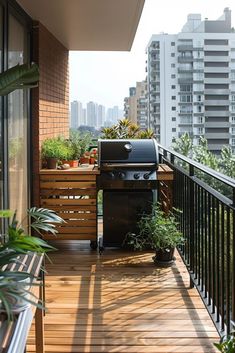 an outdoor grill on a balcony with potted plants