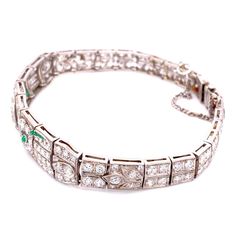 Platinum Art Deco Diamond Bracelet 5.75tcw &.10tcw Emeralds Art Deco Hallmarked White Gold Bracelets, Art Deco Hallmarked White Gold Bracelet, Art Deco White Gold Tennis Bracelet With 17 Jewels, Platinum Tennis Bracelet With 17 Jewels For Wedding, Hallmarked Diamond Bracelets Fine Jewelry, Classic Diamond Bracelet With Hallmark, Hallmarked Diamond Bracelets In Fine Jewelry Style, Classic Hallmarked Diamond Bracelet With Cubic Zirconia, Classic Cubic Zirconia Diamond Bracelet Hallmarked