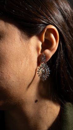 Discover timeless elegance with our Traditional Portuguese Filigree Earrings. Each piece is meticulously crafted by hand using ancient filigree techniques passed down through generations. Features: Material: High-quality 925 Sterling Silver Style: Traditional Portuguese Size: 4 cm Closure: Stud Details: These earrings stand out for their delicacy and complexity, capturing the essence of Portuguese jewelry. The intricately detailed design is perfect for any occasion, whether it's a formal event o Portuguese Jewelry, Earrings Stand, Filigree Jewelry, Traditional Earrings, Earring Stand, Filigree Earrings, Detailed Design, Jewelry Lookbook, 925 Silver Earrings