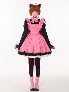 Cardcaptor Sakura inspired three-piece set featuring a black long-sleeve dress, a hot pink apron dress, and a matching bow train.  The black dress boasts elegant long sleeves with layered cap lace sleeves, a high neck, and a delicate white lace hemline. The hot pink apron dress is adorned with a pleated bodice, flutter shoulder straps, and a self-tie sash. Complete the look with the two-layered big bow at the back waist, featuring an organza train for an extra touch of charm.  Black Dress Size Chart:   	 		 			Size 			S 			M 			L 			XL 		 		 			Full Length (White lace trim not included) 			86 			88 			90 			92 		 		 			Bust 			89 			93 			97 			101 		 		 			Waist (Elastic Waist) 			67-80 			71-84 			75-88 			79-92 		 	   Pink Apron Size Chart:   	 		 			Size 			S 			M 			L 			XL 		 		 			F Pink Long Sleeve Fairy Kei Dress, Pink Long Sleeve Dress For Cosplay, Pink Bow Dress For Costume Party, Pink Gothic Costume Dress, Harajuku Pink Dress For Cosplay Events, Harajuku Style Pink Dress For Cosplay Events, Harajuku Style Pink Dress For Cosplay, Pink Fairy Kei Dress For Costume, Pink Fairy Kei Costume Dresses