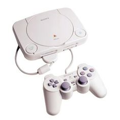 an image of a video game system with two controllers on the front and one controller in the back