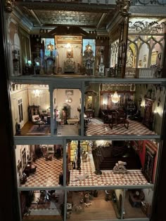 the inside of a doll house with many rooms