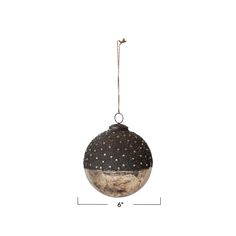 a ball ornament hanging from a rope on a white background with measurements for the length