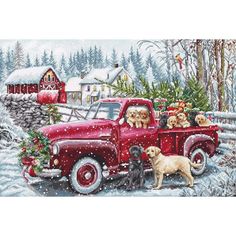 a red truck with puppies in the bed and christmas tree on the back is shown