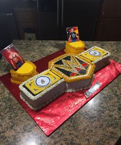 the cake is shaped like a wrestling belt