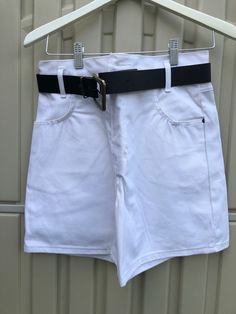 Santa Barbara Clothing Co White Denim Shorts Made in Canada  100%  Cotton Black belt Front and back pockets New...never worn Size 11 Measurements taken while laying flat Waist 14" Inseam 5" Length from top of waist to bottom of leg Purchase price includes free shipping in Canada and the USA International shipping is available Please contact before purchase for shipping quote Any questions, just ask! Vintage item, regular wear due to age should be expected Any know flaws/ markings will be listed White Belted Short Bottoms, White Belted Bottoms Short Length, White Belted Short Length Bottoms, White High Waist Jean Shorts With Belt Loops, Casual White Bottoms With Belt, White Cotton Jean Shorts With Belt Loops, White Denim Shorts, Short En Jean, Skorts