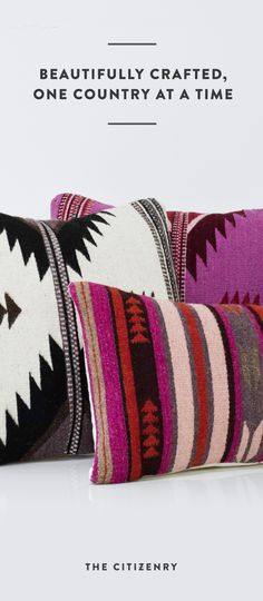 three colorful pillows with the words, beautifully crafted one country at a time on them