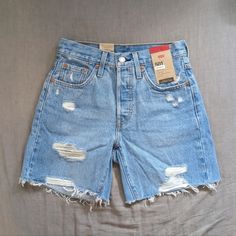 New With Tags. High Rise, Button Fly. 100% Cotton. Denim Mom Shorts Outfits, Mid Thigh Jean Shorts Outfit, Mid Jean Shorts Outfit, High Waist Denim Shorts, Mid Thigh Jean Shorts, Cheap Washed Mid-rise Jean Shorts, Mom Jean Shorts, Shorts For Thick Thighs, Levi Jorts