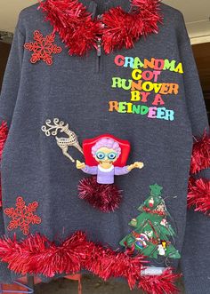 an ugly ugly sweater with the words grandma, i got over reindeer and christmas tree on it