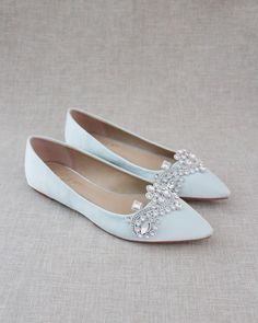 Inspired by a contemporary and refined designed ballet flat. This pointed toe satin flat embellished with rhinestones applique makes this shoe shine bright like a diamond. Choose from a subtle small touch of frost to an oversized bling. Perfect for fall wedding shoes, bridal shoes, bridesmaids shoes, quincenaera shoes, holiday shoes and all your special occasions. Pair with a matching clutch to complement your look: https://www.etsy.com/listing/1302254706/ DETAILS: COLORS AVAILABLE: White, Ivory Elegant Embellished Flat Ballet Flats, Elegant Embellished Ballet Flats For Formal Occasions, Embellished Elegant Ballet Flats, Elegant Embellished Ballet Flats, Elegant Blue Ballet Flats, Elegant Fitted Flats For Wedding, Spring Formal Embellished Ballet Flats, Elegant Fitted Wedding Flats, Elegant Blue Evening Flats