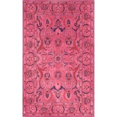 a pink rug with an intricate design on the front and back side, in various colors