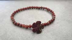 4 mm Red Jasper Flower Round Elastic Beaded Bracelets M a t e r i a l : ♡ 4 mm red jasper ♡ elastic S i z e : please select size S h i p p i n g : ♡ All items shipped worldwide by Thailand post. ♡ Shipped within 2- 3 days after payment received. ♡ Can be upgrade to express mail by a request before payment. You will take : ♡ 15 - 25 days after shipped from Thailand . ♡ 5- 7 days after shipped from Thailand by express mail. Bohemian Flower Stretch Bracelet As Gift, Bohemian Flower Stretch Bracelet Gift, Adjustable Red Flower Beaded Bracelet, Red Bohemian Flower Beaded Bracelets, Bohemian Red Flower Bracelets, Red Flower-shaped Bohemian Beaded Bracelets, Red Flower-shaped Beads For Gifts, Bohemian Red Flower Beaded Bracelet, Red Flower Shaped Bracelets For Gifts