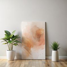 three potted plants sit in front of a large painting on the wall next to two white vases