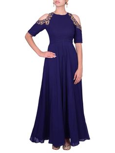 This navy blue georgette floor length with cold shoulder and a button up back is accessorized with zardozi cutwork on the cold shoulder.Care:Dry Clean Only and to be Steam PressedComposition:Georgette Festive Floor-length Gown With Embroidered Sleeves, Festive Georgette Gown For Gala, Festive Evening Dress With Embroidered Neckline, Festive Blue Dress With Embroidered Sleeves, Blue Wedding Dresses With Embroidered Sleeves, Evening Maxi Dress With Embroidered Neckline, Festive Maxi Dress With Embroidered Neckline, Elegant Off-shoulder Reception Dress, Elegant Party Gown With Embroidered Sleeves