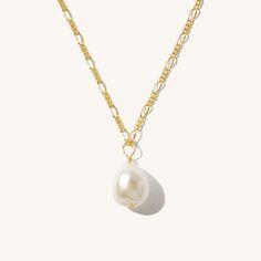 The Baroque Pearl necklace is a gorgeous addition to any look. Featuring a freshwater pearl whose shape is one of a kind (just like you!) this piece makes a sweet statement. It's perfect for all your outings, whether it's to get your morning matcha or to join your friends for a girls' night in town. Feel adorable and stylish wearing it on any occasion! DETAILS Necklace length: 18" with 2" extender 14k gold filled -or- sterling silver chain, spring clasp, & findings 10-12mm baroque freshwater pea Classic Pearl Necklace, Detailed Necklace, Baroque Pearl Necklace, Gold Pearl Necklace, Pearl Hoop Earrings, Favorite Rings, Necklace Sizes, Gold Filled Chain, Baroque Pearls