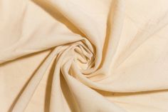 a close up view of a plain white fabric