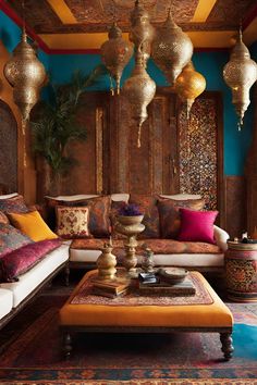 a living room filled with lots of furniture and colorful pillows on top of it's walls