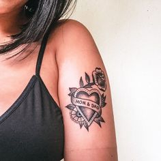 a woman with a tattoo on her arm