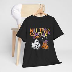 This Will trade Candy for Soccer Halloween Funny T-Shirt is perfect for those who love a good joke and enjoy the spirit of Halloween. It's a unisex shirt that adds a fun and playful element to any casual outfit. Ideal for Halloween parties and trick-or-treating adventures. Product features - Unisex Heavy Cotton Tee made from 100% cotton for year-round comfort - Shoulder tape stabilizes the back of the garment to prevent stretching - Knitted in one piece without side seams to reduce fabric waste - Ribbed knit collar without seam for elasticity and shape retention - Made with specially spun fibers for smooth fabric and vibrant printing Care instructions - Machine wash: warm (max 40C or 105F) - Tumble dry: medium - Do not iron - Do not dryclean Funny Halloween T-shirt With Letter Print, Funny Halloween T-shirt For Streetwear, Funny Halloween Streetwear T-shirt, Black Deadstock T-shirt For Halloween, Halloween Fun T-shirt With Funny Text, Green Halloween T-shirt With Character Print, Novelty Halloween T-shirt For Streetwear, Halloween Novelty T-shirt For Streetwear, Trick Or Treat Costume