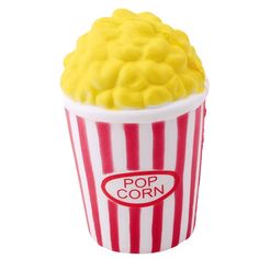 a popcorn bucket filled with yellow and red popcorn