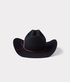 Outer Range is black as night but made to be worn around the clock - a cowboy hat personified as the adventurer, soul seeker, and cowpuncher. Spurred on by the literature of age-old cowboy poetry and the feeling you get when you’re alone under the dusty sun - freedom is found under a hat… it’s found in the Outer Range. This piece is a traveling partner and an overlooked journal - a way to relive the memories made and miles traveled through the scuffs and sweat stains. A black Beaver body is your canvas to paint stories for the next generation. In the meantime, we’ve taken the liberty to kickstart your journey with a hand-dyed 2 ply deadstock hatband and signature NF match detail. A gold-plated toothpick is there for when ya need it! If you’re hat could talk, what would it say? Designed in Outer Range, Cowboy Poetry, Barn Boots, Polo Shoes, Fur Accessories, Sweat Stains, Freedom Is, Loafer Sneakers, Book Candle