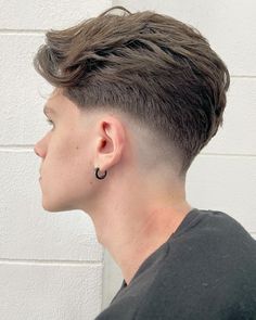 Fade Haircut Men's Long Hair, Low Taper Fade Haircut Wavy Hair Boy, Fade Undercut Mens, Side Fade Haircut Men Medium Long, Faded Haircut For Men Medium Long, Undercut Fade Mens, Mens Haircut Long On Top Short On Sides, Fade With Long Hair On Top, Disconnected Undercut Men