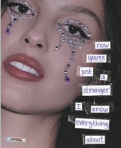 a woman with glitter on her face and words all over her face