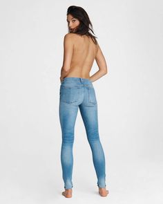 The mid-rise jean, perfected. Slim through the hip and thigh with a skinny leg, raw hem, and ideal ankle crop. Sits at the natural waist. Made from premium stretch denim in a medium indigo wash. rag & bone Women's Slim Fit Mid Indigo Jeans | Hazy Daze, 30 (also in 23,24,25,26,27,28,29,31,32) Stretch Mid-rise Jeans With Frayed Hem, Dark Wash Stretch Cutoff Jeans, Stretch Cutoff Jeans With Frayed Hem, Fitted Cutoff Jeans With Five Pockets, Indigo Jeans, Raw Denim, Saturated Color, Mid Rise Jeans, Jeans For Sale