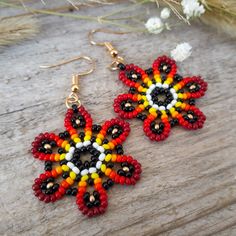 Red Flower earrings. Beaded dangle earrings in floral hippie style - a great gift for women, mom, girlfriend of girl for Christmas, Birthday, Mother's Day, Valentine's Day and other holidays. These hand woven earrings are made of Czech beads. Such Mexican style, Huichol inspired summer seed beads earrings are perfect for both evening and casual wear. READY TO SHIP! Dimensions: All Length: 57 mm ( 2.24 inch) Flower: 31 x 35 mm ( 1.22 x 1.37 inch) Weight 1 earring: 3 g PLEASE NOTE: * That actual colors may vary slightly from their appearance on the display. * The goods are delivered in a small sac sewn by hand. The color and shape of the sac may differ from what you see in the photo. My original earrings are created and hand crafted with great care for you . With such unique jewelry, you wil Huichol Pattern, Seed Beads Earrings, Huichol Earrings, Woven Earrings, Red Flower Earrings, Native Crafts, Beaded Jewellery, Great Gifts For Women, Beads Earrings