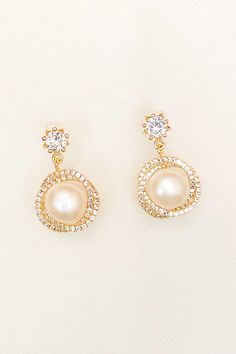 Elegant Pearl Earrings With Cubic Zirconia, Elegant Sparkling Drop Pearl Earrings, Elegant Sparkling Pearl Drop Earrings, Elegant Sparkling Bridal Earrings, Elegant Crystal Pearl Earrings With Sparkling Stones, Elegant Pearl Earrings With Sparkling Stones, Elegant Round Crystal Pearl Earrings, Elegant Pearl White Crystal Pearl Earrings, Elegant Pearl Earrings With Sparkling Stones For Gift