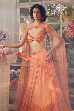 Buy Orange Organza And Net Hand Embellished Sequins Cataloupe Pleated Lehenga Cape Set For Women by Tabeer India Online at Aza Fashions. Lehenga Cape, Pleated Lehenga, Cutdana Work, Cape Set, India Dress, Cape Style, Abstract Hand, Fashion App, Set For Women