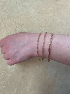 "Super trendy and stylish handmade sterling silver paperclip bracelets 2.5mm, 3mm & 4mm Solid 925 sterling silver with rose gold finishro Stamped \"925\" & \"Italy\" We have in 6-8\" Here is weights for 7\"...if your bracelet is longer or shorter weight will vary slightly 2.5mm- 2g 3mm- 2.7g 4mm- 4.8g Ships fast We also sell matching chains Let us know if any questions" Rose Gold Oval Link Paperclip Bracelet, Rose Gold Link Paperclip Bracelet With Adjustable Chain, Rose Gold Bracelets With Rectangular Links For Everyday, Everyday Rose Gold Bracelets With Rectangular Links, Classic Rose Gold Paperclip Bracelet With Rectangular Links, Minimalist Rose Gold Paperclip Bracelet For Everyday Wear, Rose Gold Paperclip Bracelet Gift, Minimalist Rose Gold Paperclip Bracelet For Everyday, Minimalist Rose Gold Link Paperclip Bracelet