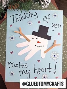 a handmade snowman card with the words thinking of you