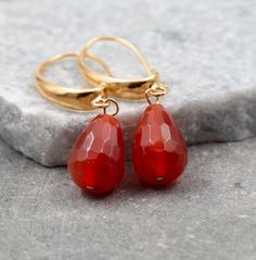 Treat yourself or a loved one with these gorgeous drop earrings. Made with lovely Carnelian stones and a contemporary design to go with your evening and daytime looks. These Carnelian earrings for women are made stunning with the combination of gold and orange color of the stone. Wear and style with other 14k jewelry pieces. Product Details: --------------------- Material: --------------------- Gold plated over brass (Nickel-free) Measurements: --------------------- Length of the whole earring - Gold And Orange, Carnelian Earrings, Gem Earrings, Gold Necklace Women, Gold Filled Earrings, Drop Dangle Earrings, Earrings Drop, Girls Jewelry, Gold Plated Jewelry