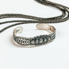 Silver cuff bracelet with a tooled design. These bracelets are pictured on a white background with silver beads at the top. Giddy Up Glamour, Handmade Sterling Silver, Beautiful Bracelet, Cuff Bracelet, Hallmark, Sale Items, Cuff, Bracelet, Sterling Silver