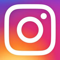 the instagram logo is shown on a blurry background with an orange and pink hue