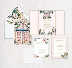 wedding stationery with tropical theme and pink flowers on the front, white envelope and matching cards