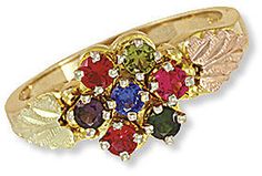 Black Hills Gold Mothers Ring with Birthstones 14k Gold Multicolor Birthstone Ring With Accent Stones, Multicolor 14k Gold Birthstone Ring With Accent Stones, Heirloom Multicolor Jewelry With Accent Stones, Multicolor Birthstone Ring With Center Stone As Gift, Multicolor Birthstone Jewelry In 14k Gold, Multicolor Oval Birthstone Ring, Multicolor Round Cut Jewelry With Center Stone, Multicolor Birthstone Jewelry For Anniversary, Multicolor Birthstone Gemstones For Formal Occasions