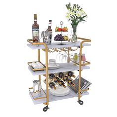 a three tiered bar cart with bottles and glasses on it's wheels is shown