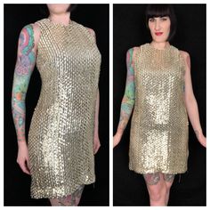 "Dazzling Vintage 1960's Metallic Gold Fully Sequined Mod Cocktail Party Go Go Shift Dress! Features: - gold metallic fully sequined woven fabric on a white acetate body - rounded neckline - darts at bust - straight A-line shift dress shape - gold metallic piping trim - 2 metal zipper closures up back; 1 on the outer sequin body, and the 2nd zipper for the lining - fully lined in a white acetate - extremely well made! The hidden double zipper feature shows a lot of detail went into making this p Metallic Sequin Dress For Festive Season, Glamorous Gold Mini Dress For Holiday Party, Gold Shimmer Holiday Dresses, Metallic Fitted Sequin Dress For Festive Occasions, Festive Fitted Metallic Sequin Dress, Gold Sleeveless Shimmer Mini Dress, Gold Sleeveless Mini Dress With Shimmer, Gold Shimmer Sleeveless Mini Dress, Gold Sequin Mini Dress For Party Season