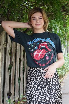 This graphic tee is one of the softest ever, & guaranteed to be one of your faves. Pair it with our Satin Leopard Skirt & Gadol Sneaker for a complete look. Definitely a must have to add to your DAYDREAMER stack. Worn in look Boyfriend fit-slightly loose Hints of glitter ink 100% Cotton Graphic Tee Work Outfit, Rock N Roll Style, Leopard Skirt, Superhero Design, Black Pencil Skirt, Teacher Outfits, Tee Outfit, Boyfriend Fit, Skirt Pattern