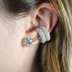 Let your style stand out with this fashion-forward design. The single ear cuff shines with 2.10ct t.w. round cut diamonds. 18K Gold: 2.99gr Diamonds: 2.10ct Available in Yellow or White Gold Natural, untreated gemstones Contact us to further customize SKU: CU234 & CU0235 Cubic Zirconia Round Ear Cuff, Fine Jewelry Diamond Ear Cuff For Anniversary, Diamond Ear Cuff With Diamond Accents For Wedding, Diamond Ear Cuff For Anniversary, Fine Jewelry Cubic Zirconia Ear Cuff With Diamond Accents, Fine Jewelry Ear Cuff With Diamond Accents, Wedding Ear Cuff With Diamond Accents, Yellow Gold Cubic Zirconia Ear Cuff, Cubic Zirconia Ear Cuff With Diamond Accents