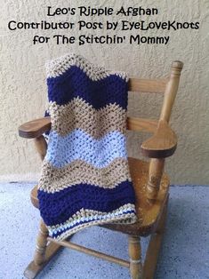 a crocheted blanket sitting on top of a wooden rocking chair