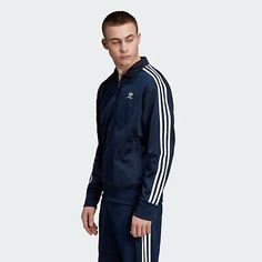 Premium Quality adidas Men's Originals Firebird Track Jacket Navy ED6070, Mens Coats Jackets Streetwear Long Sleeve Track Jacket With Ribbed Cuffs, Long Sleeve Streetwear Track Jacket With Ribbed Cuffs, Sports Fall Windbreaker With Ribbed Cuffs, Urban Track Jacket With Crew Neck And Ribbed Cuffs, Urban Crew Neck Track Jacket With Ribbed Cuffs, Casual Fitted Track Jacket For College, Sports Long Sleeve Windbreaker With Ribbed Cuffs, Navy Track Jacket For Spring Streetwear, Sporty Track Jacket With Pockets For College