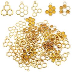 several pieces of gold metal with honeycombs