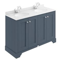 two sinks are shown in the same color as the cabinets and countertop is white