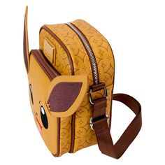 Make the catch for an adorable addition to your Pokémon collection with a crossbody bag inspired by Eevee. With plenty of room to store your gear, this accessory makes the perfect choice for any adventure. This bag is an officially licensed Pokémon product. Dimensions: 6.25”W x 8.25”H x 2.25”D Material: Faux leather (polyurethane) Features: Adjustable shoulder strap, front zipper pocket, shiny silver hardware, and applique, embroidered, debossed, and printed details. Eevee Cosplay, Pokemon Hunt, Pokémon Collection, Men Secret Santa Gifts, Pokémon Eevee, Music Gadgets, Christmas Gifts For Teenagers, Pokemon Collection, Pokemon Eevee