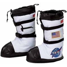 pair of white and black boots with nasa patches on the side, one has an american flag patch