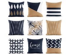 six pillows with different designs on them, one is blue and the other has gold